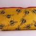 Busy Bees Make up bag in yellow leather