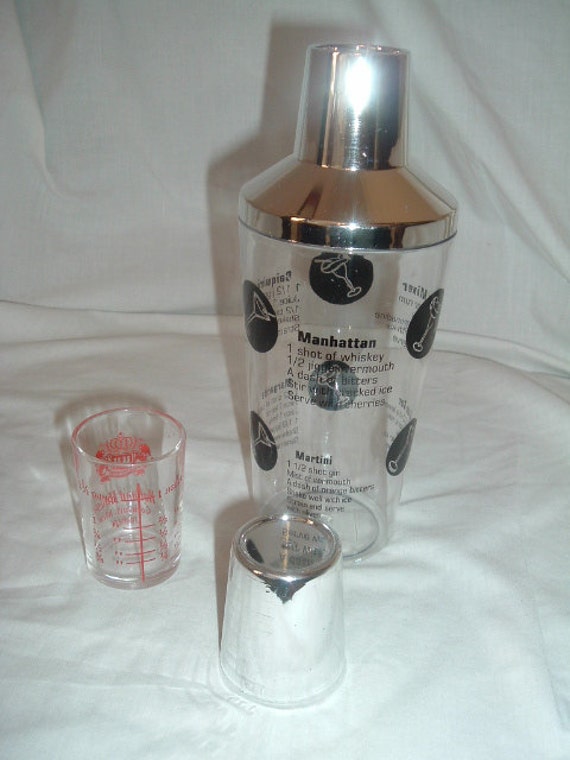 vintage plastic drink mixer and glass jigger
