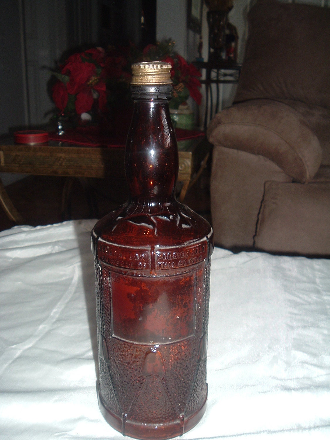 antique old drum brown whiskey bottle