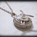 MOVING FORWARD, antique silver steampunk spinner locket necklace