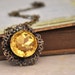 THE SUNFLOWER, antique brass necklace with vintage topaz glass jewel