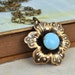 SAKURA, antiqued brass cherry blossom flower pendant vintage blue glass jewel