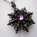 Black Amulet Necklace. Snowflake with Amethyst Swarovski Gem.