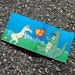 Godzilla vs. Unicorn wallet - Andrew Bargeron for Tinymeat