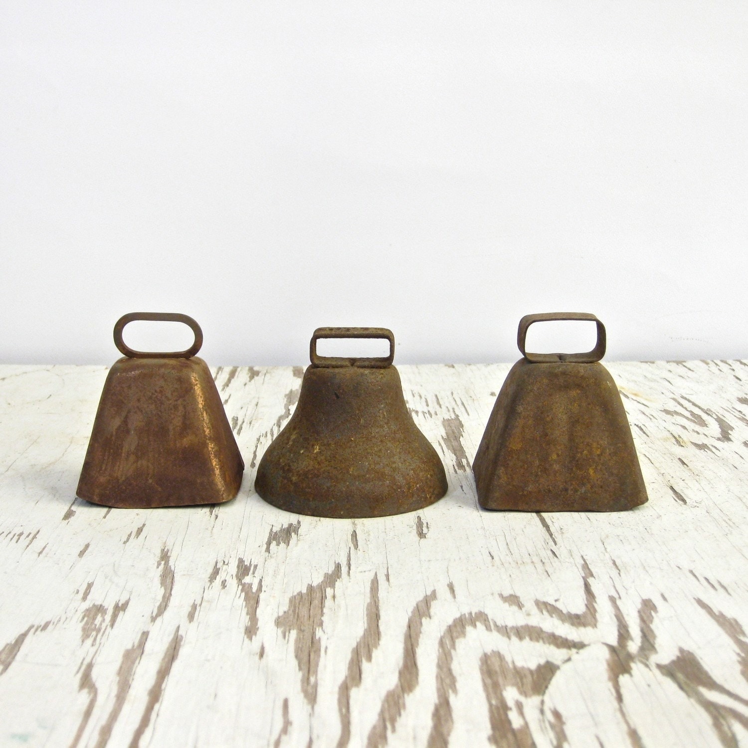 collection of rustic cowbells