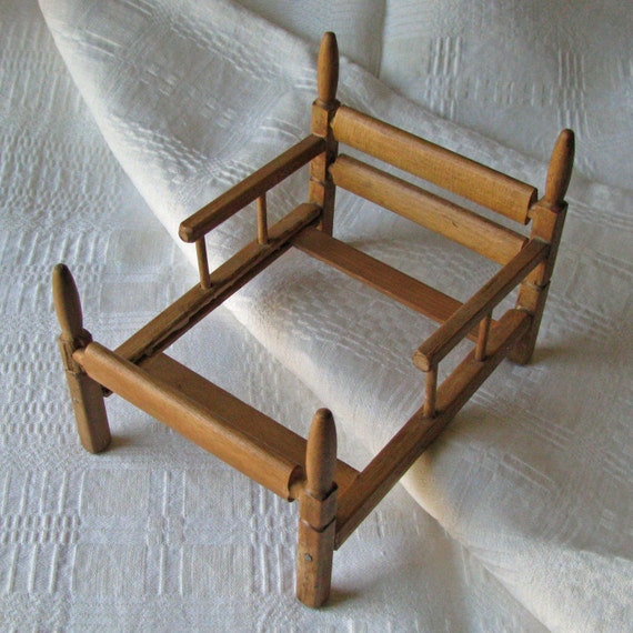 Vintage wooden doll bed