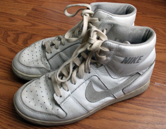 white and grey high top air force ones