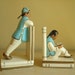 Alexander Backer Oriental bookends, aqua cream gold chalkware