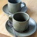 Pottery espresso cups and saucers - a handmade set of two in smokey blue