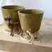 Set of two stoneware pottery goblets - glazed in lichen green
