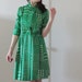 grass green 1970 secretary dress . polka dots and ascot necktie .small.medium .sale