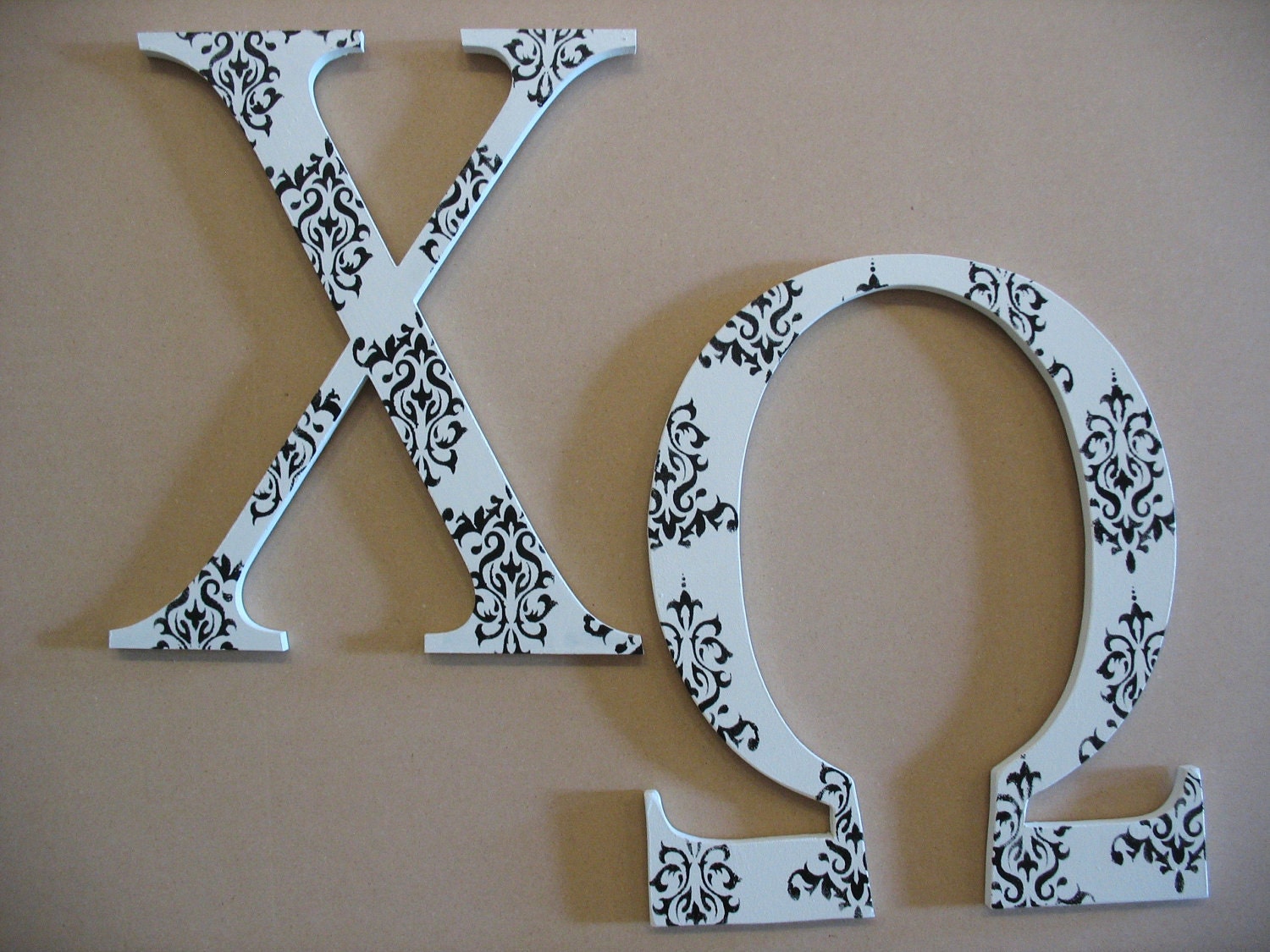 chi-omega-large-greek-letters