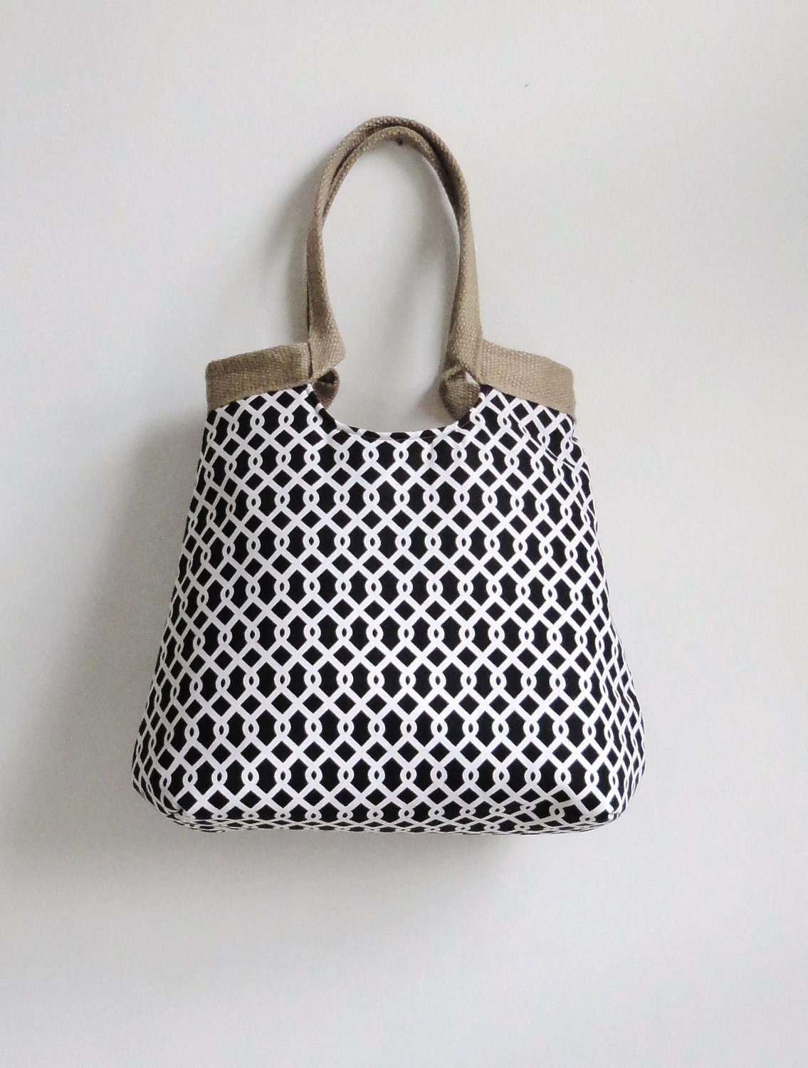 Black geometric carry on hobo bag with burlap