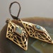Vintage filigree bronze earrings in rhombus shape with abalone shell