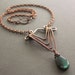 Copper necklace in art deco design with smooth flashy labradorite drop stone pendant