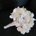 Ivory jeweled glimmery bridal bouquet in dogwood and hydrangea blooms