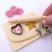 The Bakers Necklace "cookies time" Miniature Board with dough ,cookies ,cookies Cutter and rolling pin charm