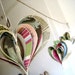 Altered book garland hearts Shakespeare pink green