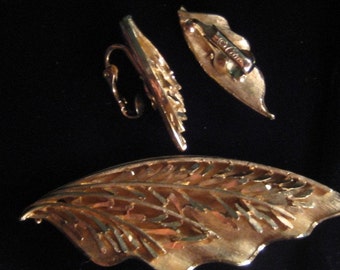 Seventies, Eighties Coro brooch and clip earrings
