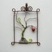 Eden - framed wire tree, serpent and apple pendant