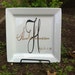 Personalized plate with last name monogram and last name overlayed