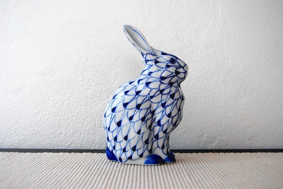 blue and white rabbit figurines