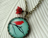 Aqua Turquoise Bird on a Branch Necklace. Red. Black