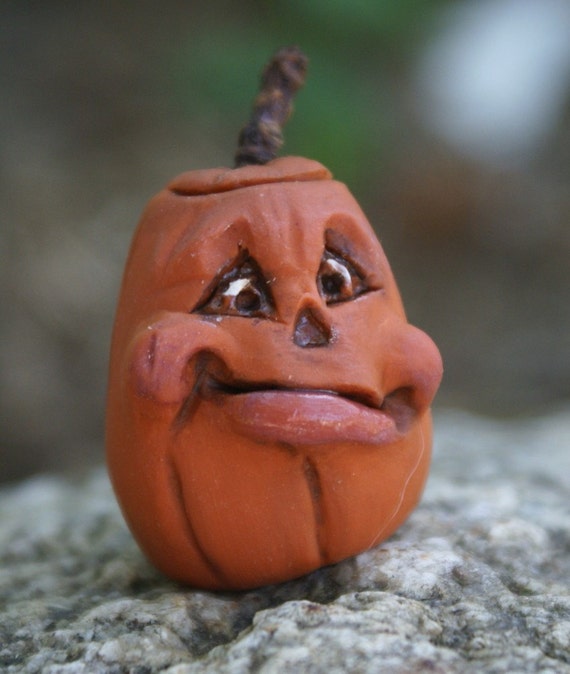 Items similar to Cute Sculpted Polymer Clay Halloween Pumpkin Figure