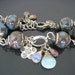 Reserved for NewMom. Lovely...Artisan Sterling Silver Wire Wrapped Glass Bead Bracelet Mocha Turquoise Pink
