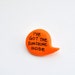 Neon orange polymer clay balloon pin