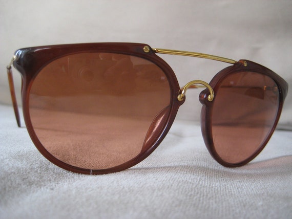 Corning Optics aviator sunglasses brown frames with rose fade