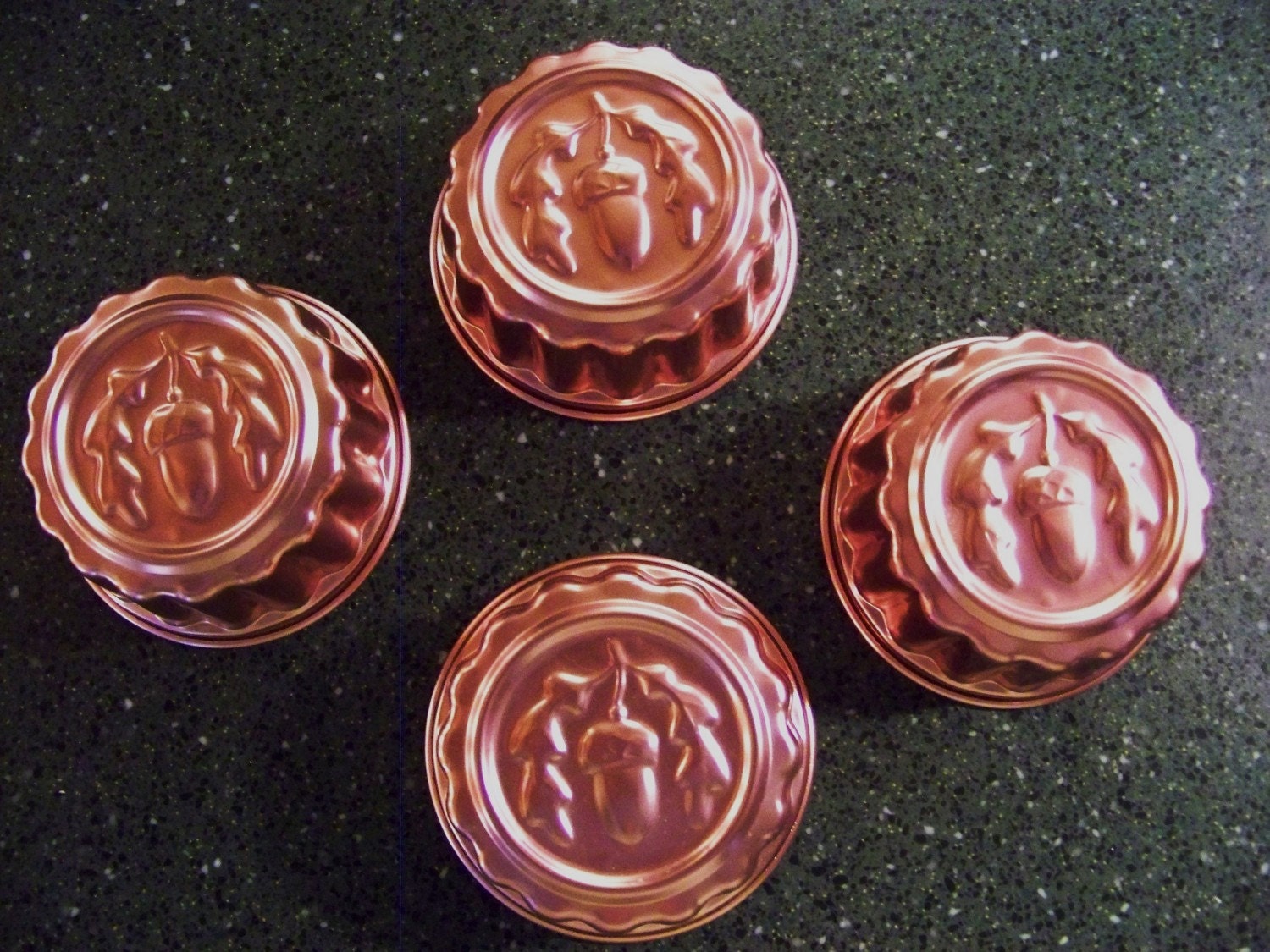 4 aluminum copper colored mini jello molds with acorn and oak