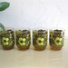Vintage 60s amber glass tumblers with Mod flowers