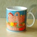 Taylor & Ng Mug Hen in a Basket Mug - Chicken - Country - Folk Art