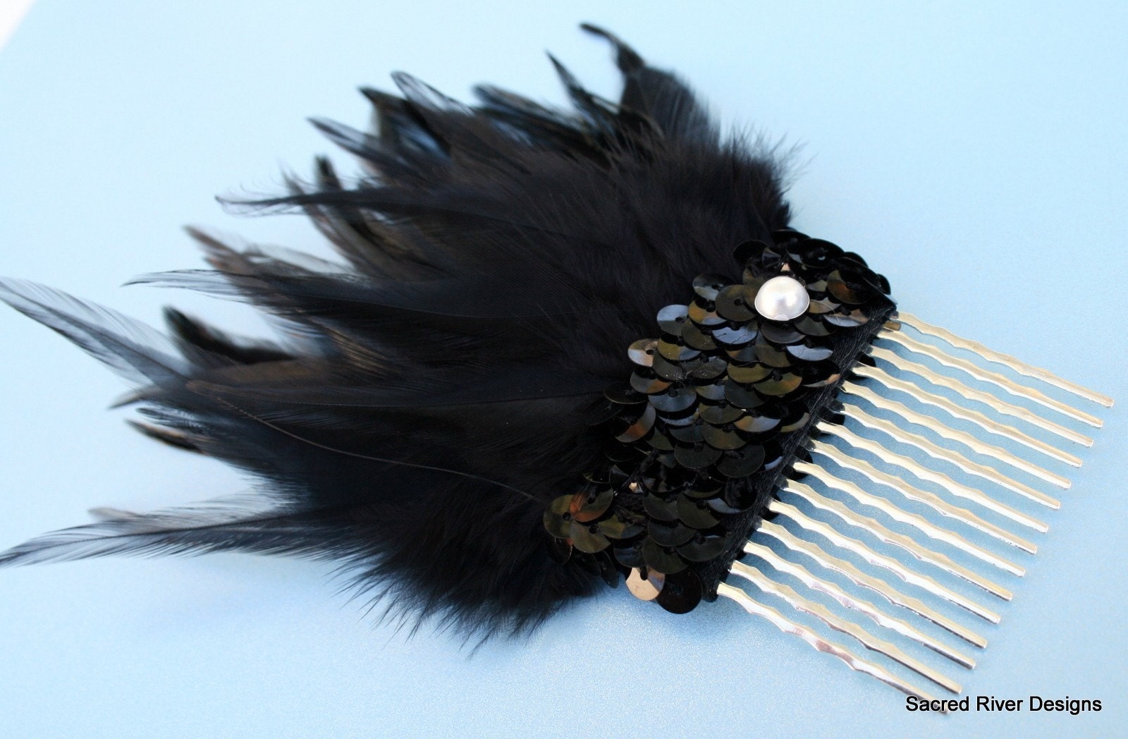 Black sequin feather hair comb