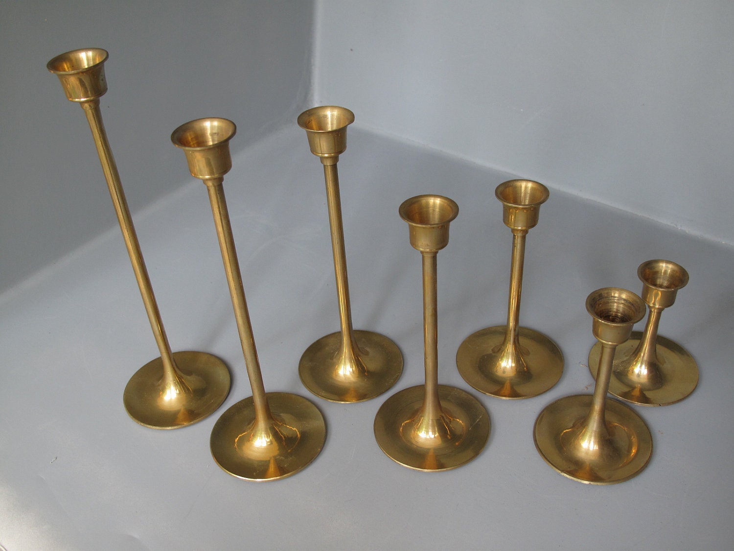 Vintage Set Of 7 Brass Candle Holders Graduated Heights