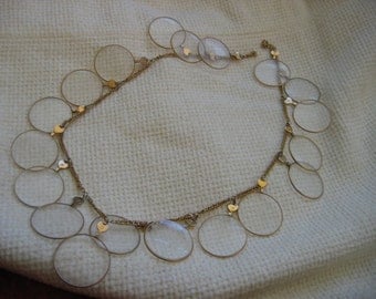 Vintage 1960's, 19 Optical Lens Necklace. Gold plated with 19 antique lenses. Decades before Steampunk.