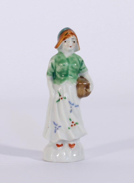 Occupied Japan Girl with Basket Figurine Reserved for