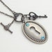 Neo Victorian antiqued silver lock skeleton key charm blue aquamrine Swarovski crystal Steampunk necklace lariat by Steampunk Nation R1063