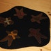 Primitive gingerbread man wool candle mat