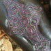 Black leather bracers with purple celtic cross