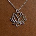 Sterling silver lotus blossom flower pendant and 18 inch sterling silver necklace