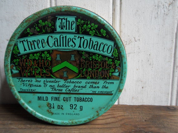 Items similar to vintage THREE CASTLES TOBACCO Round Metal Tin on Etsy