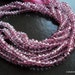 CLEARANCE - Light Pink Mystic Topaz Microfaceted Rondelles, 4mm - 1/2 strand