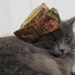 Vintage mini pill box hat in olive green and pink floral, Gracie Cat modeling