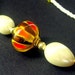 Eyeglass Lanyard. Eyeglass Chain Beaded in Orange and Ivory. Handmade Accessories.