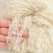 Kid Mohair boucle Yarn natural white color - perfect for doll hair and knitting.