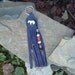 Leather fringe keychain with a hand carved alabaster white stone horse fetish on the front