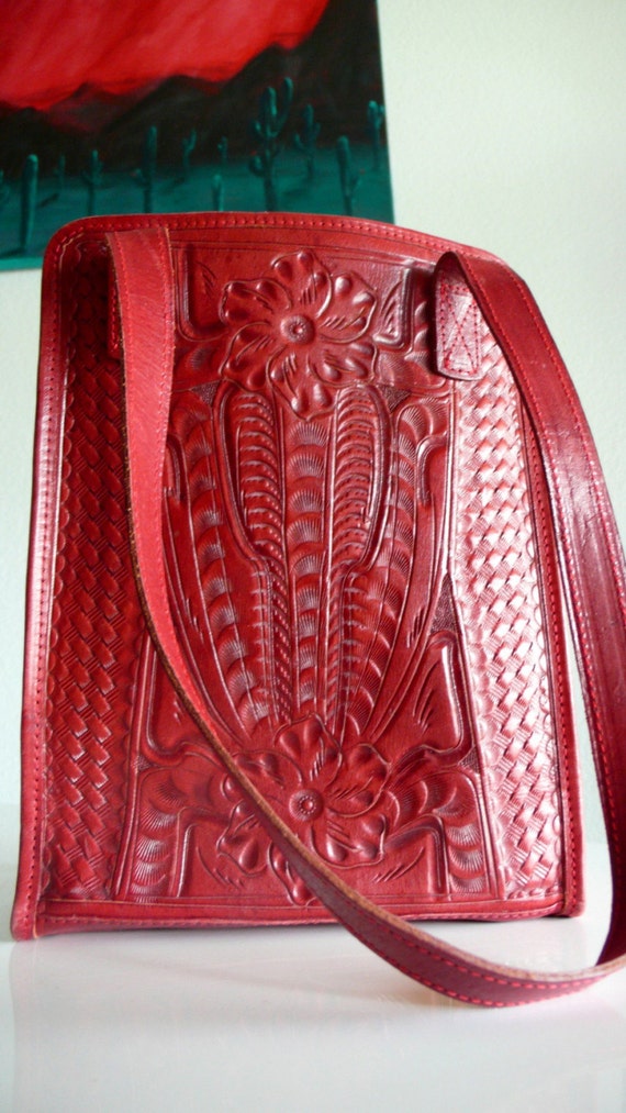 red tooled leather purse