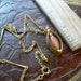 Vintage faux Opal Marquise shaped neacklace with 2 small CZ gold tone unique design on necklace